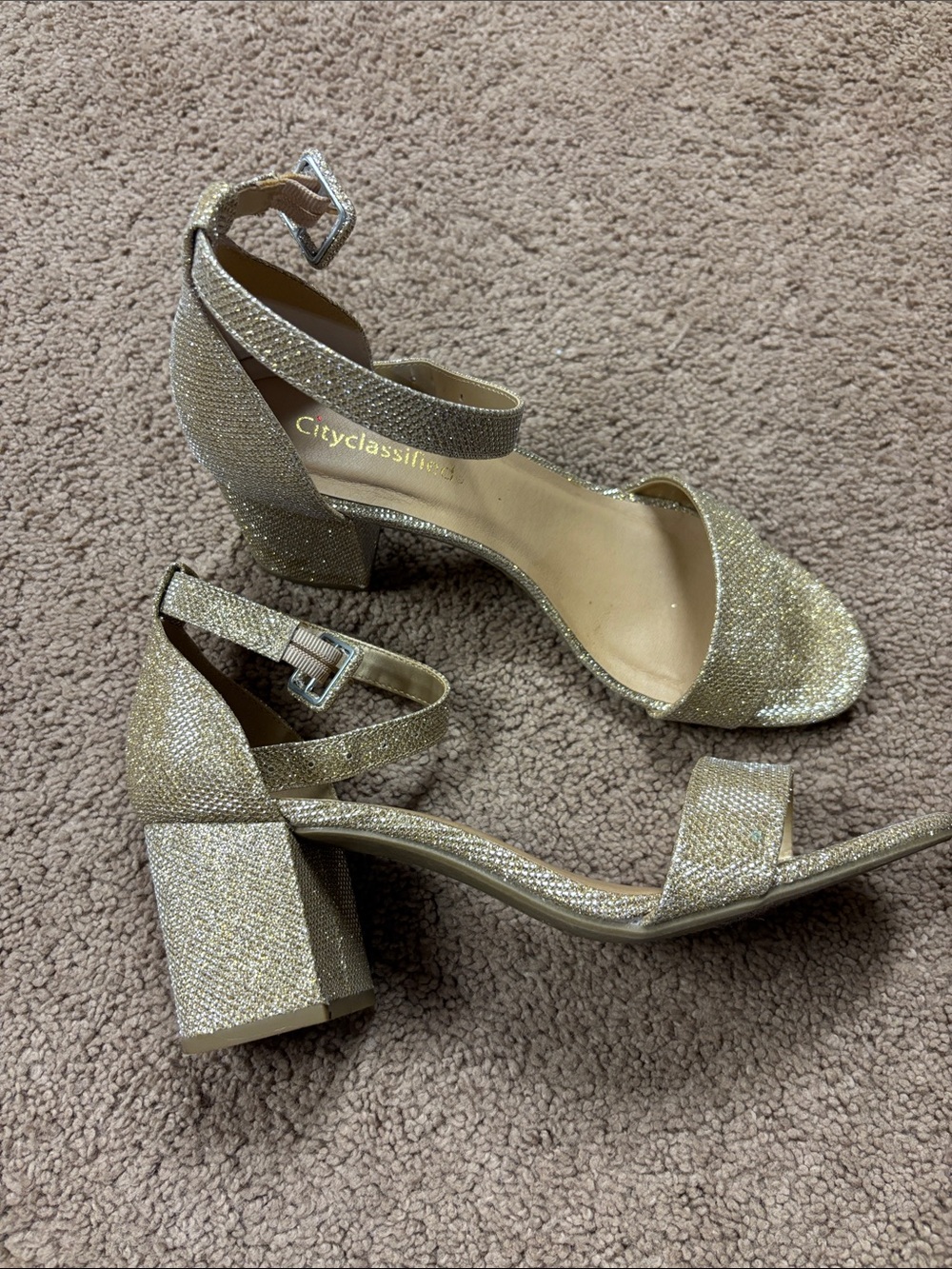 Gold glitter high heel shoes